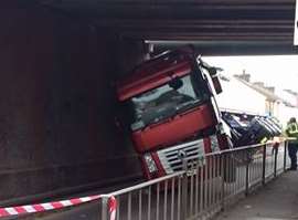 The lorry wedged under the bridge. Picture: Angie Hughes