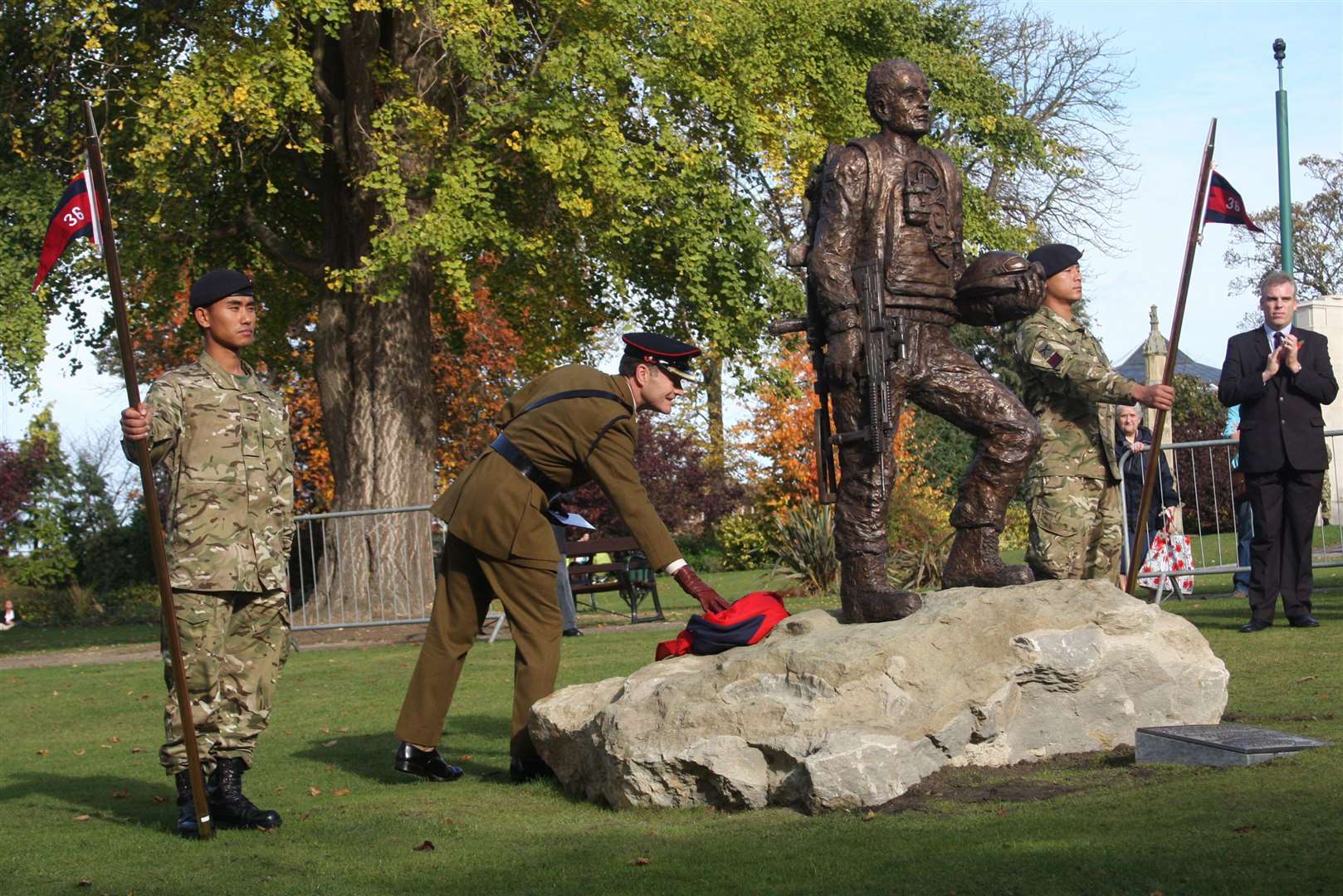 Lt Col Simon Hulme unveiling the statue in 2011. Picture by: John Westhrop
