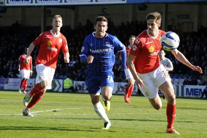 A determined Cody McDonald closes down the Crewe defence Picture: Barry Goodwin