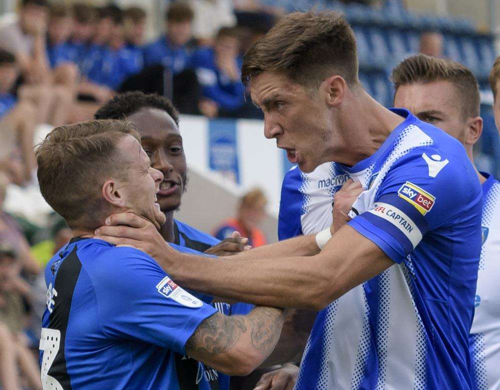 Mark Byrne and Colchester's Luke Prosser clash before Byrne was sent off Picture: Andy Payton