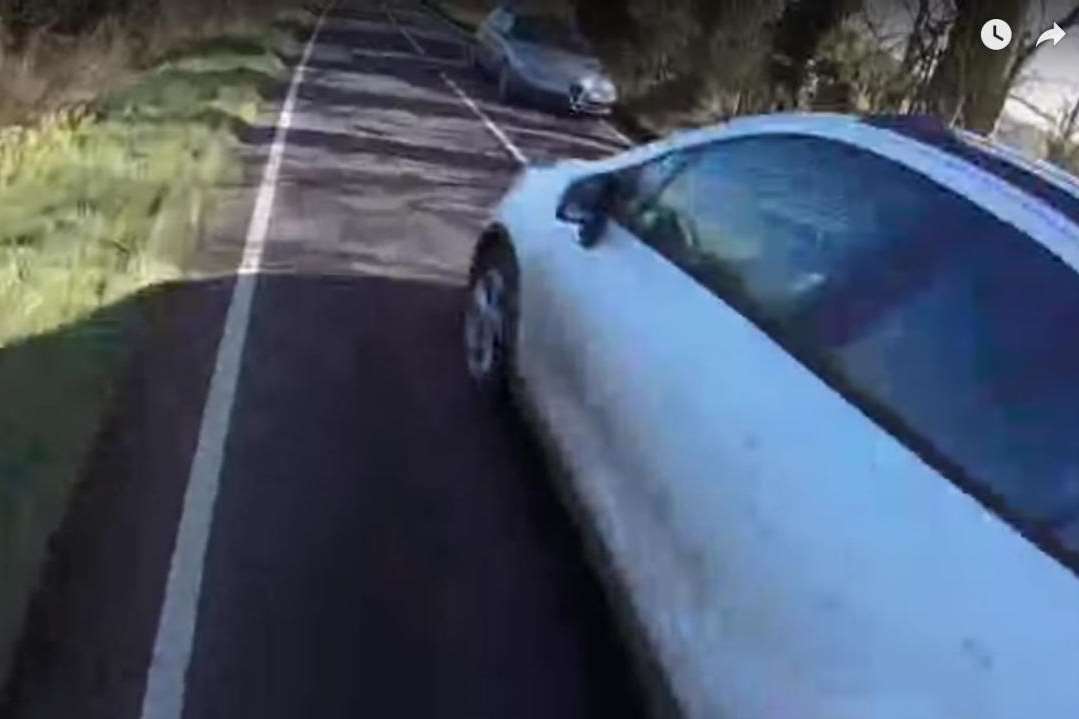 Footage shows the impatient driver narrowly missing Eliza.