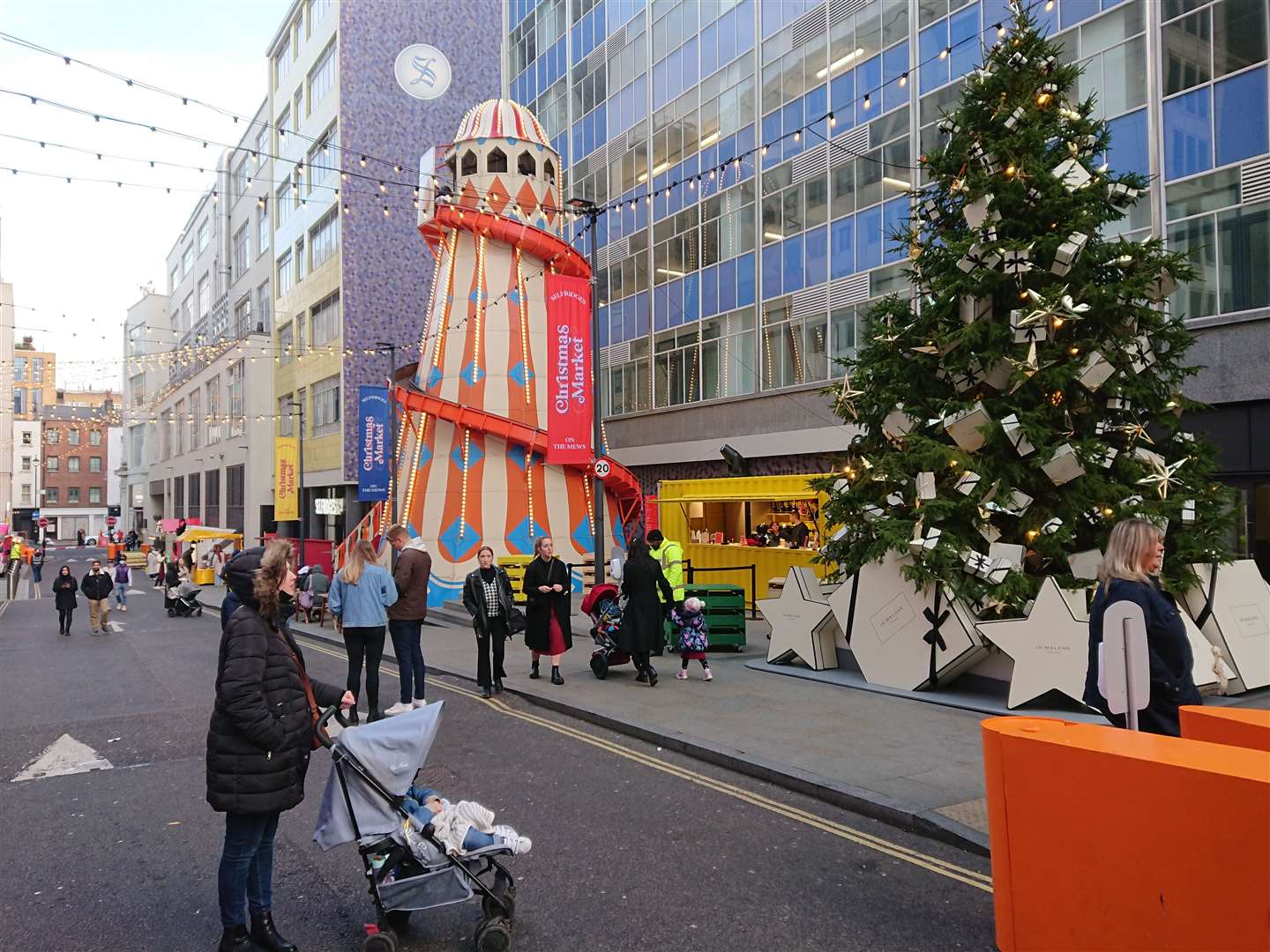 The giant Christmas tree and helter skelter at the Selfridges Christmas Market on the Mews
