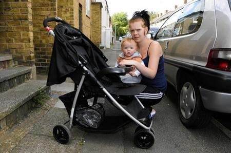 Mum Emily Moseley with Kenziie whose broken pram made him fall and hit his head.