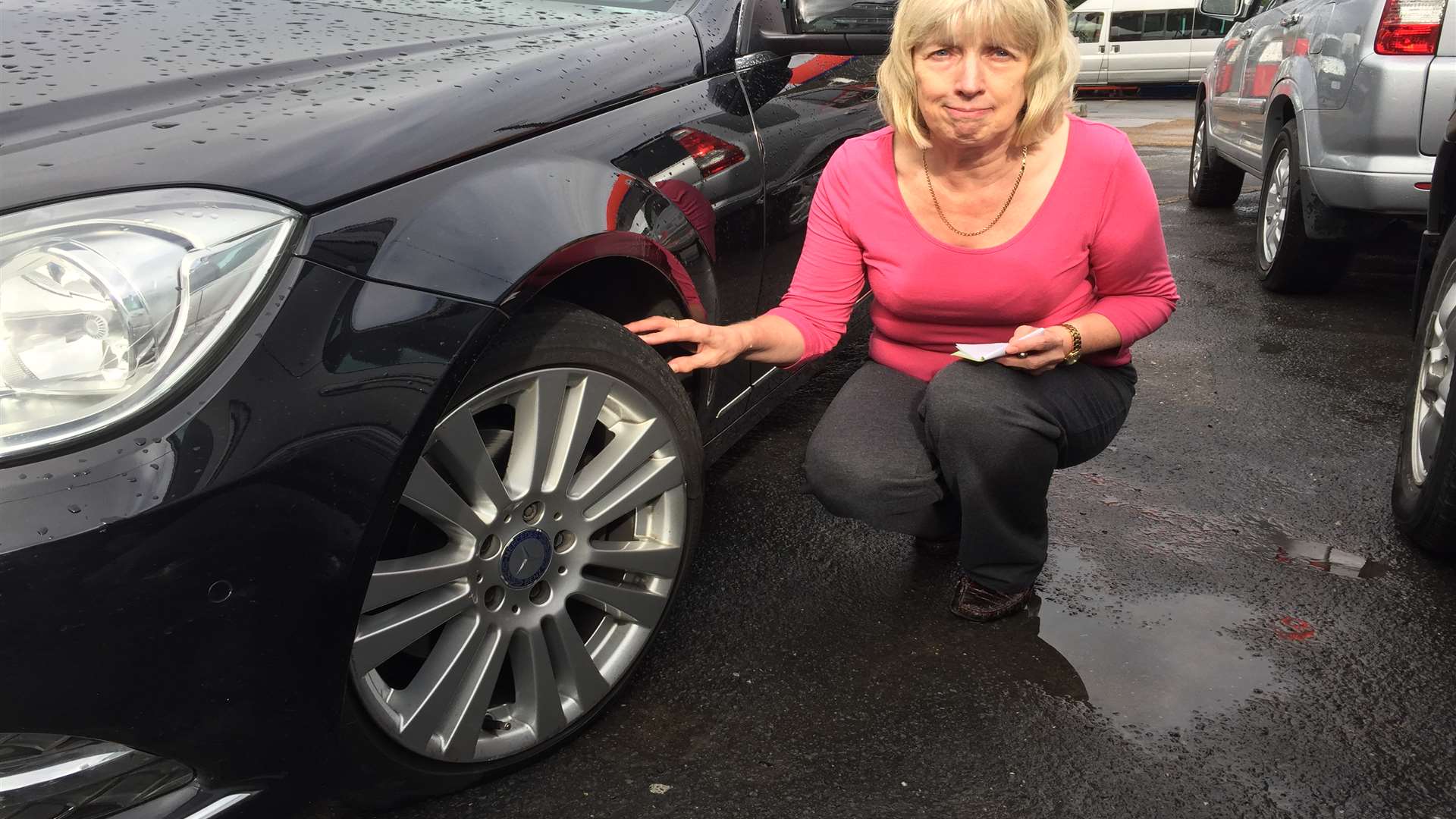 Lynn Coutts with her flat tyre