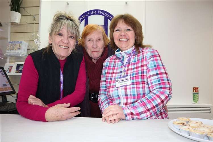 Volunteer Molly Johal, centre, joined by manager Sheila Sulley, left, and assistant manager Julia Purkins at the opening of the Wisdom Hospice charity shop in Sheerness High Street