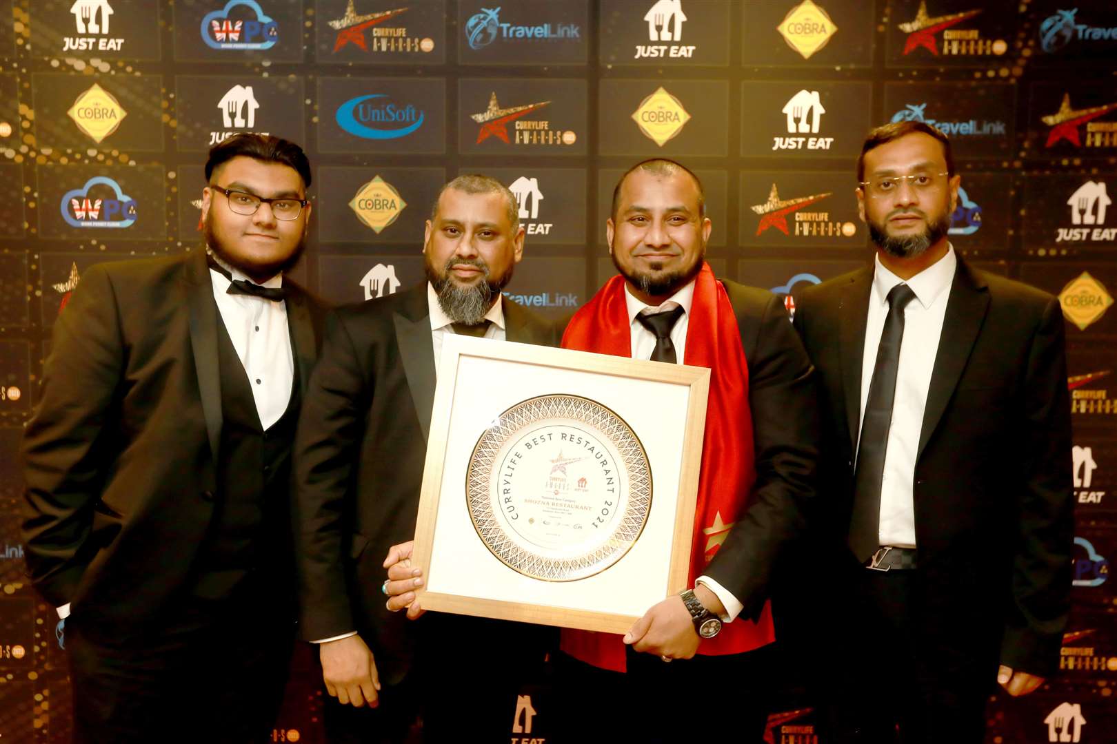 From left to right: Shozna team, Raffe Ahmed, Jalal Ahmed, Jamal Ahmed and Rose Ahmed with their Curry Life award. Photo: Curry Life Magazine