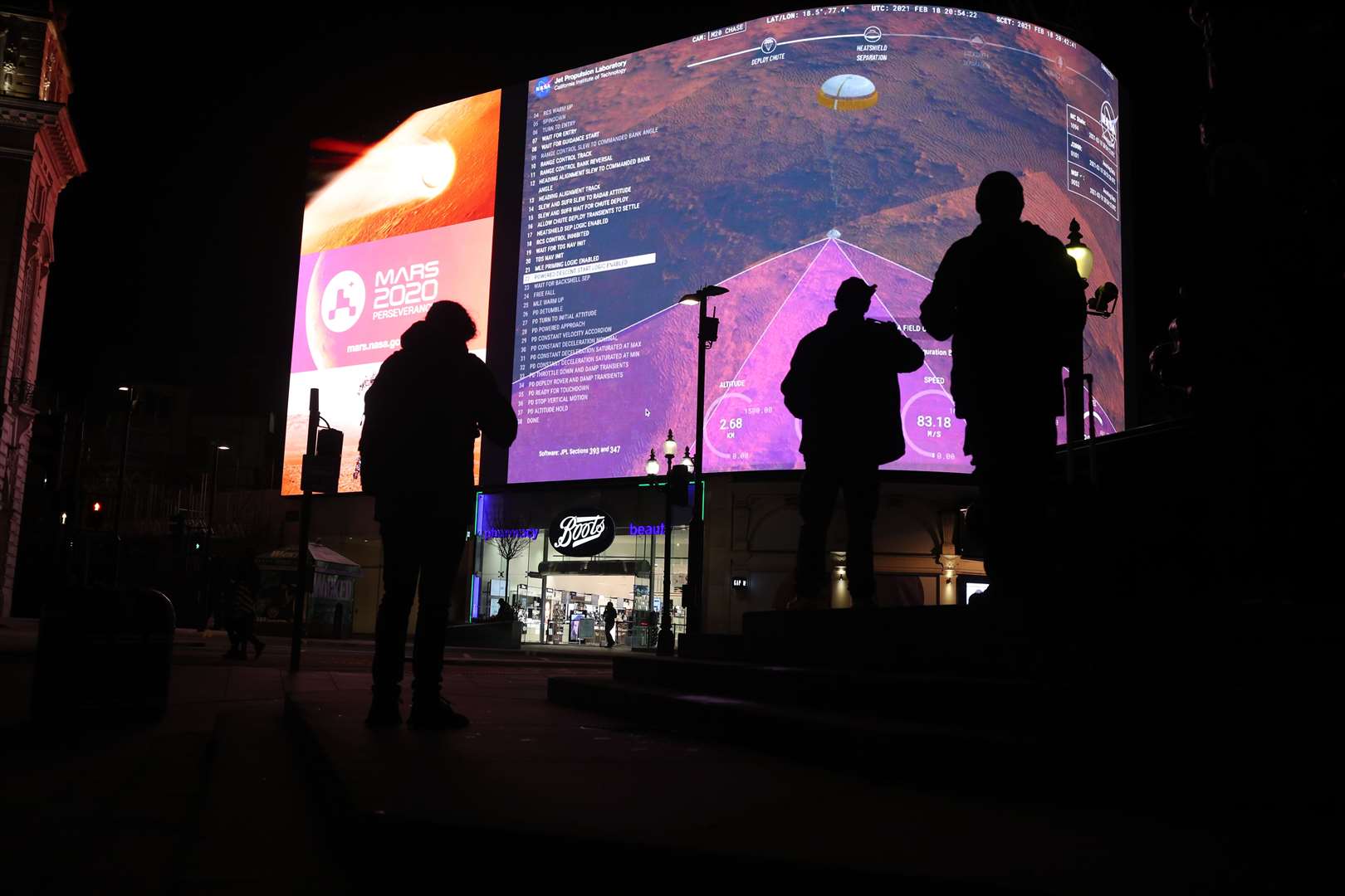 Images from the Perseverance landing were live streamed on Piccadilly Lights in central London (Yui Mok/PA)