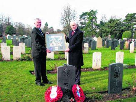 Peter Nixon and Admiral Sir Ian Garnett at the graveside of Eugene Esmonde
