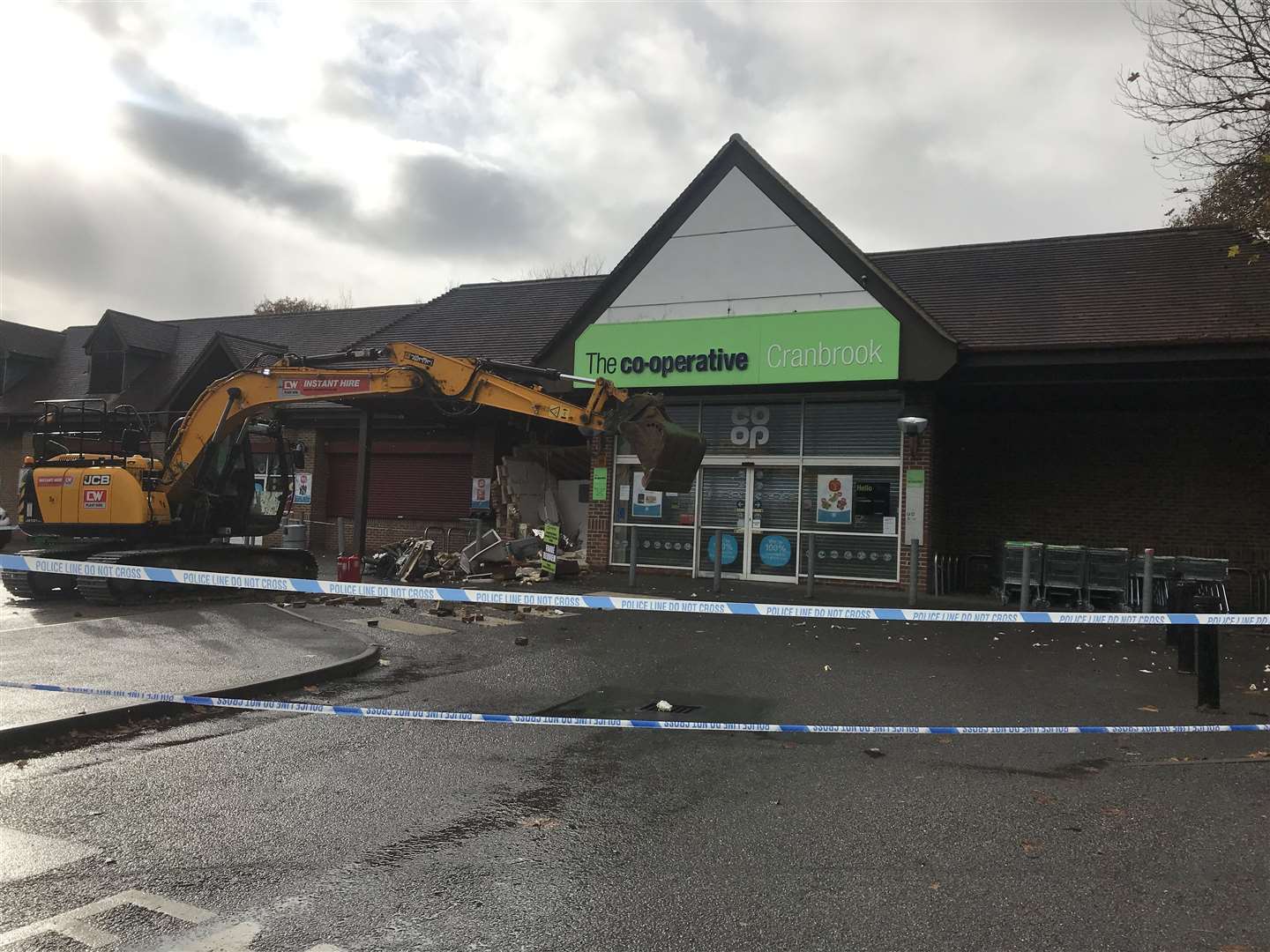 A JCB was used to ram raid the cash machine outside Co-Op off High Street, Cranbrook