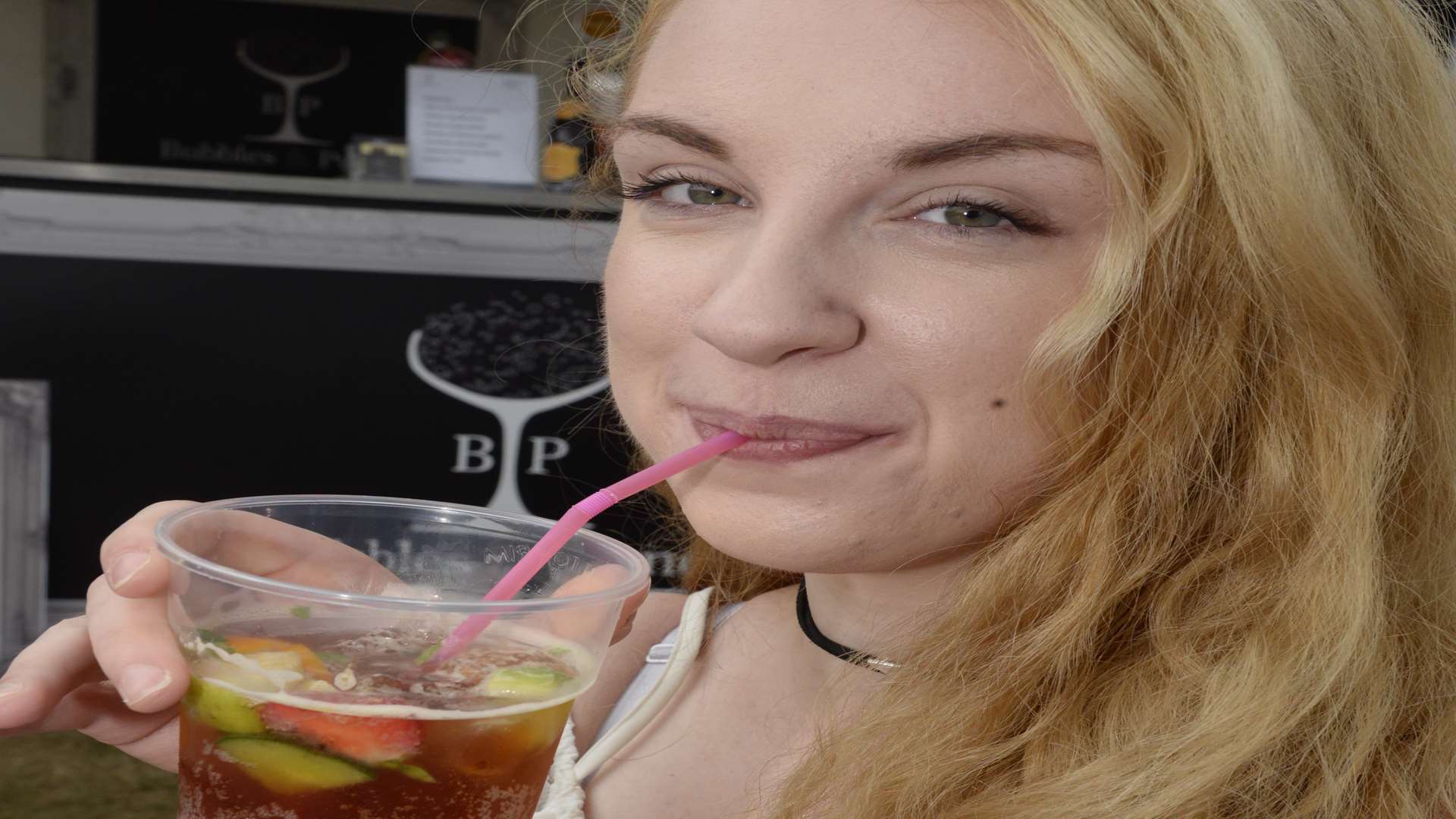 Hannah Keers enjoys a Pimms at the festival last year Picture: Chris Davey