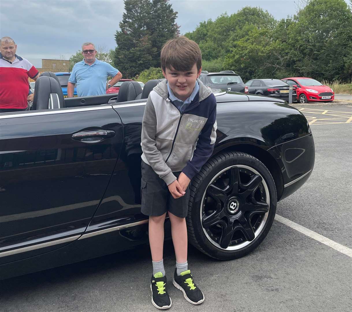 Connor, 11, had loads of fun playing with Kevin's Bentley. Picture: Di Gaffney