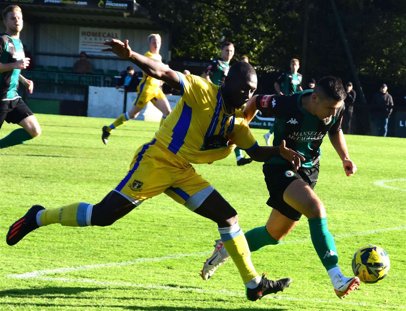 Sittingbourne battle for possession at Burgess Hill on Saturday. Picture: Phil Dennett