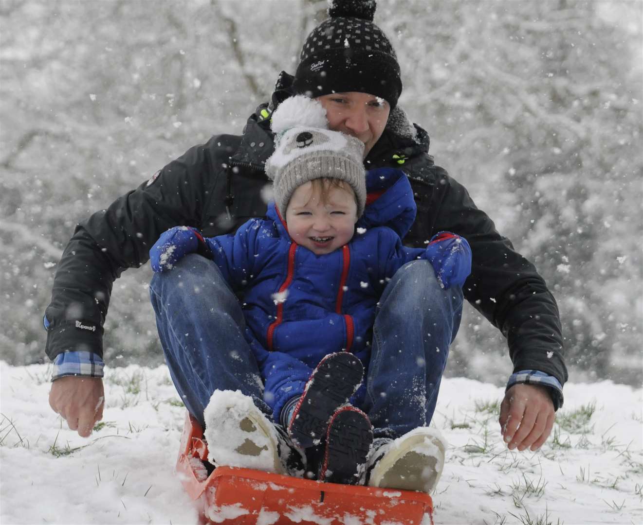 Ian McLeod with his son Dylan at Victoria Park in Ashford during a snowy spell earlier this year