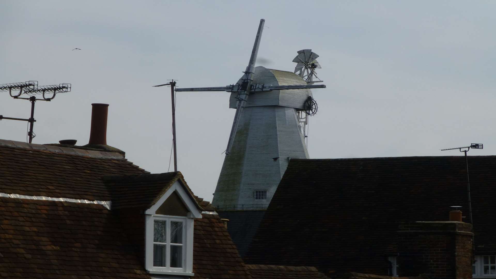 The mill dominates the town's skyline