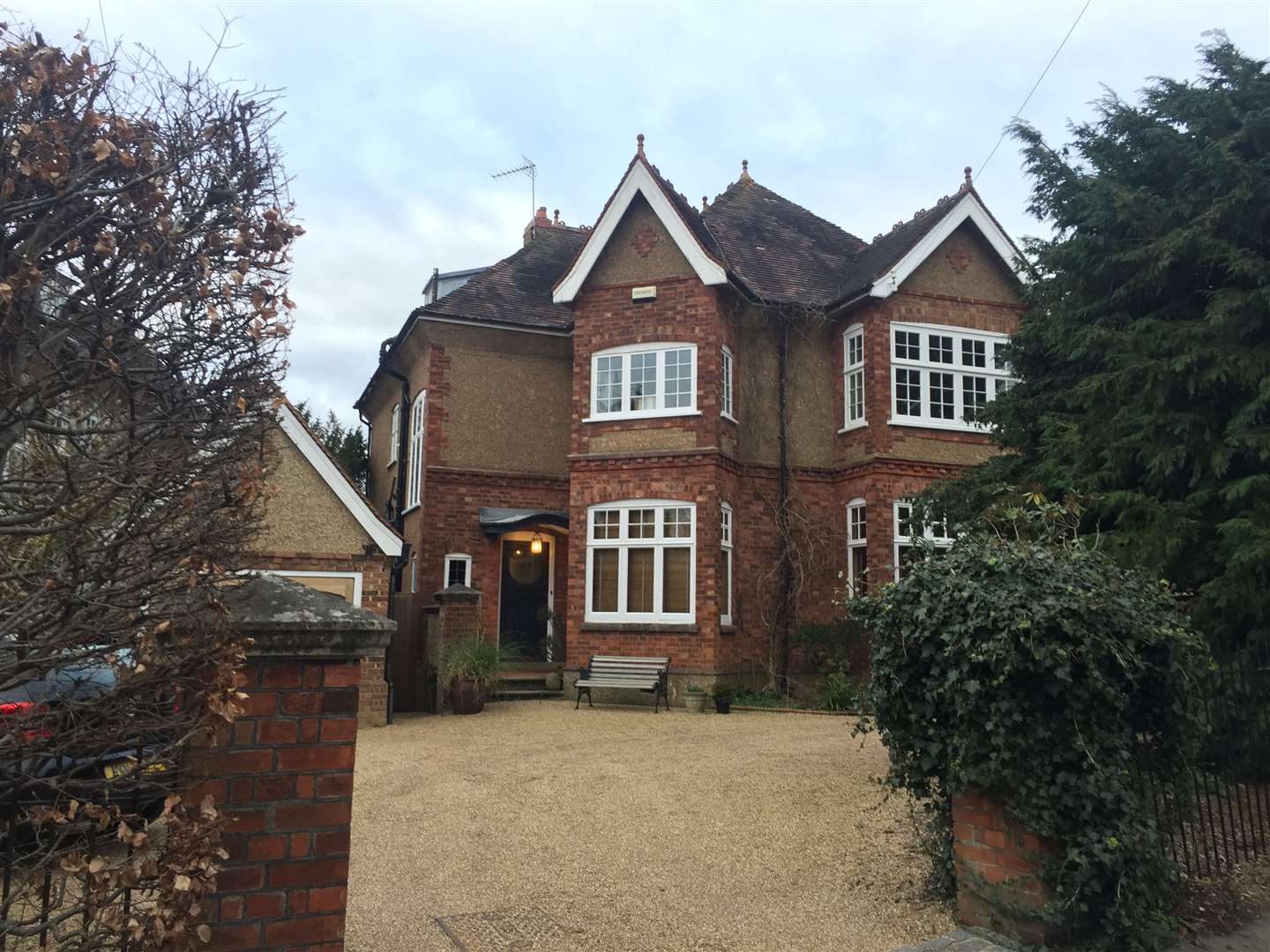 The roads surrounding the town centre are filled with large, detached properties