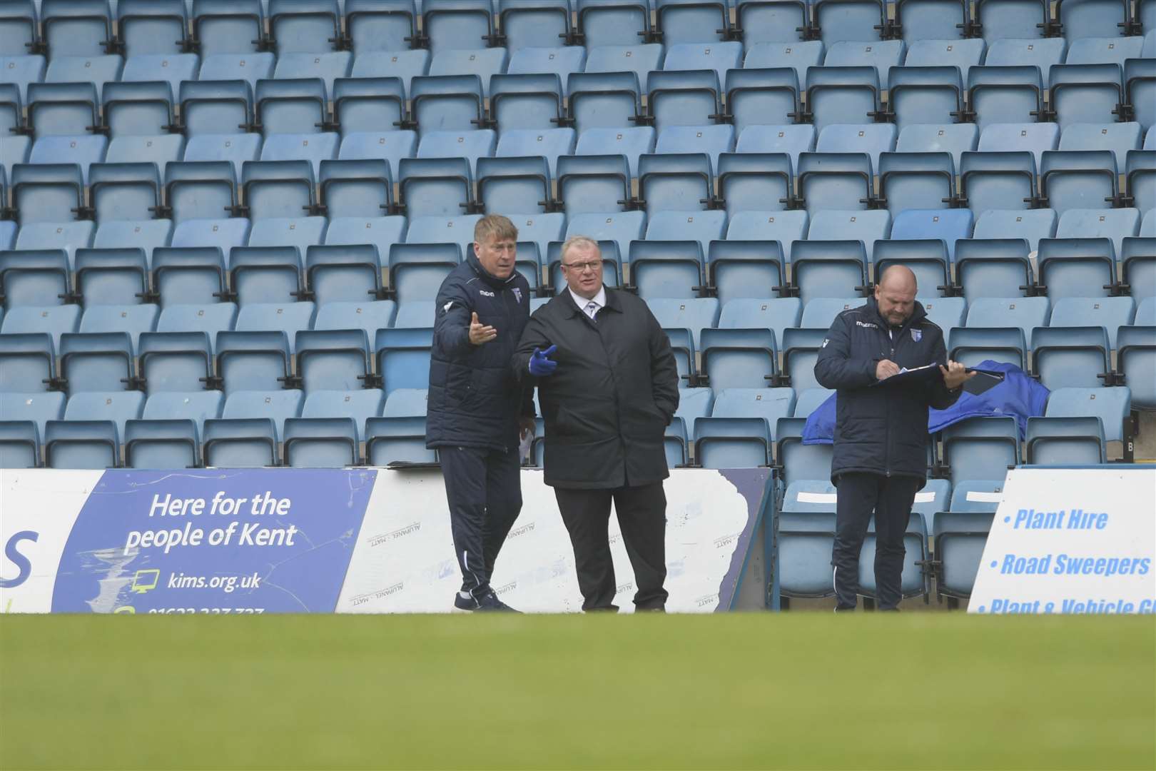 Paul Raynor and Steve Evans have been managing Gillingham without the support of the fans in the stands this season Picture: Barry Goodwin