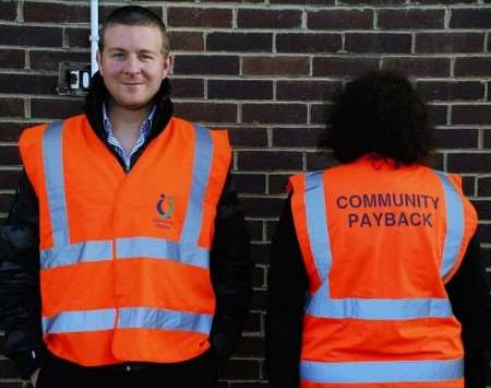 Kent Probation staff model the new high visibility vests which will be worn by offenders