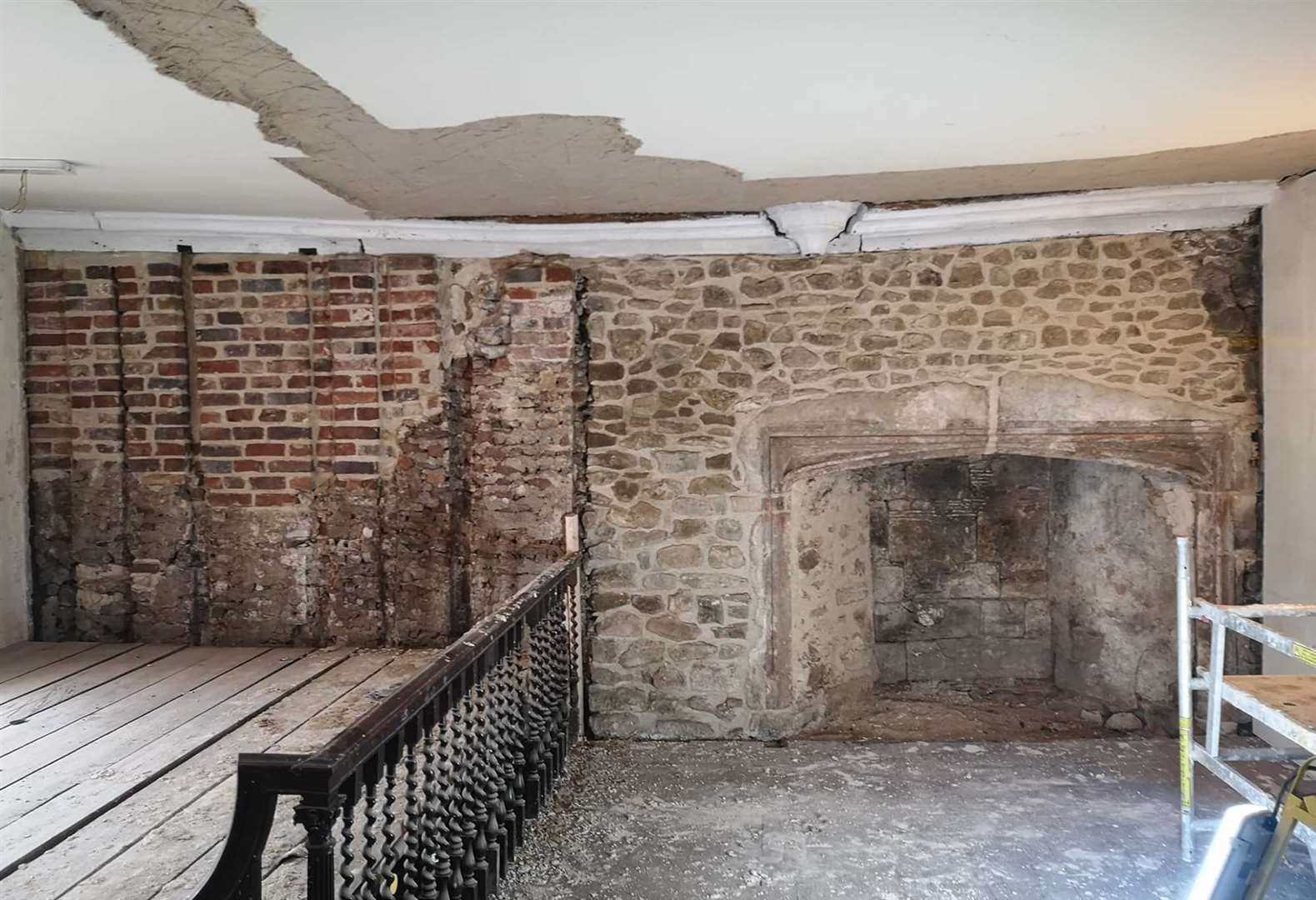 Owner Belinda captured the process of finding the historic Tudor fireplace.  Photo: Belinda Demirbasa