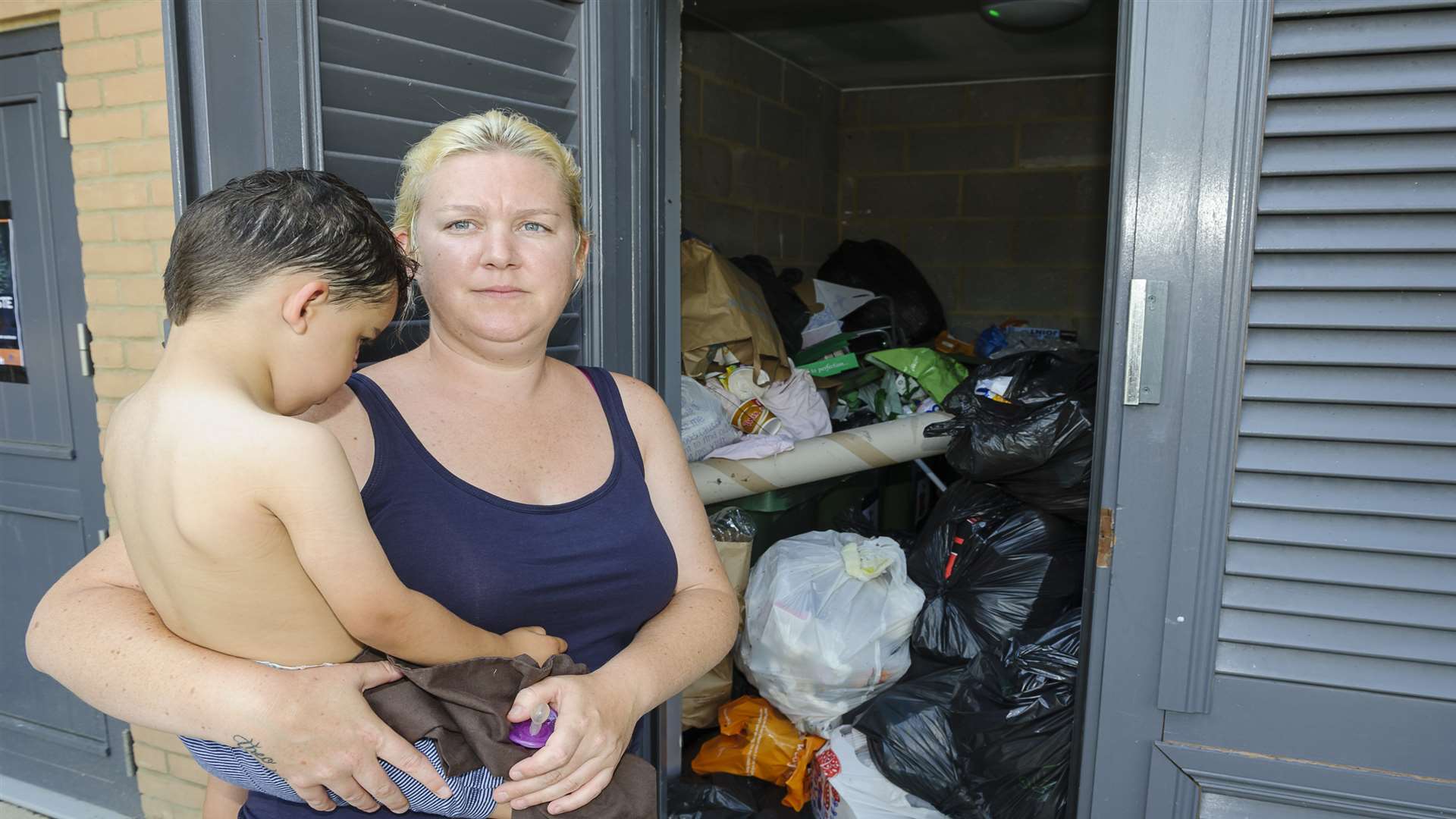 Vicky Bax, with Theo, 2, at the bin store