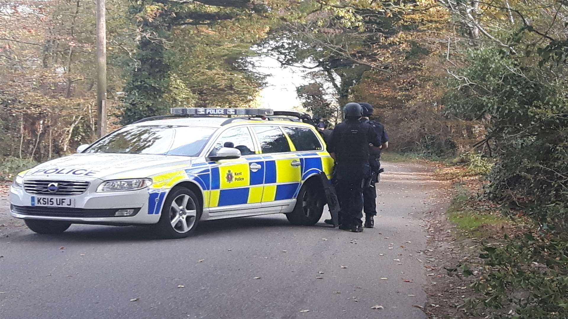 Armed officers in Plurenden Road