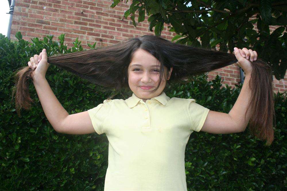 Hair today but gone soon - Medine Bilgen, 10, from Birchington, is cutting off her hair in aid of the Little Princess Trust which supplies wigs to children who have lost their hair through illness.