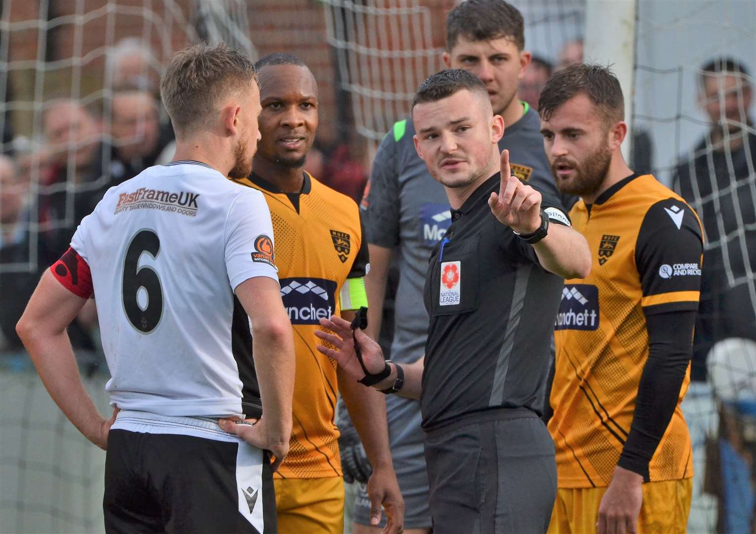 Regan Booty's first red card is withdrawn by referee Ross Martin, who awarded a goal instead Picture: Phil Cannings