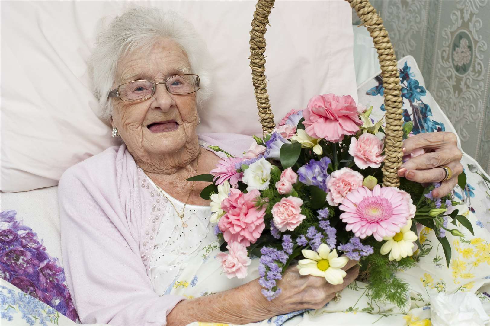 Dorothy with her birthday bouquet and message from the Queen