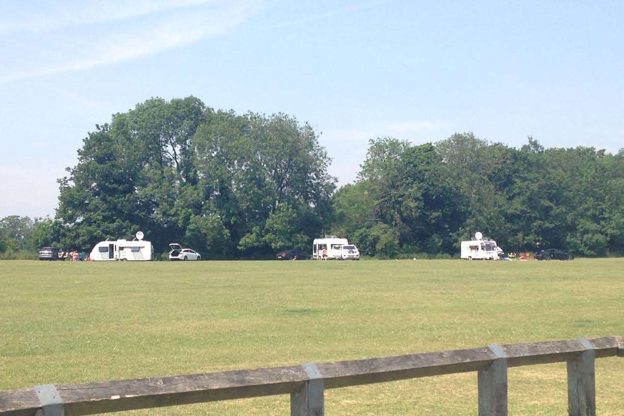 Five caravans and their vehicles are at Luton Recreation ground.