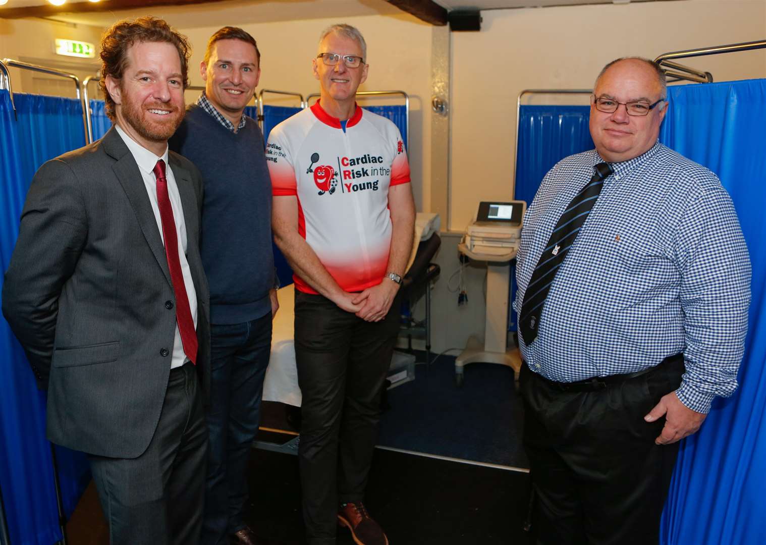 From left to right, Steve Cox, chief exe of CRY, Andy Scott, a CRY patron, Roger Maddams, and Steve Churcher, then-chairman of Tonbridge Angels. Picture: Matthew Walker