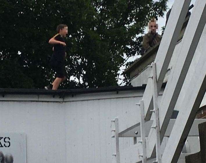 Two boys on the roof of the Silverbacks gym