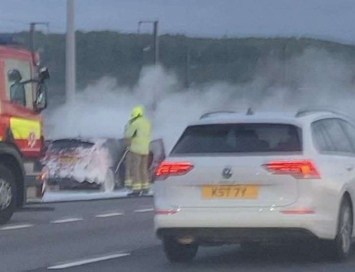 Fire crews tackle the vehicle blaze on the Medway Bridge