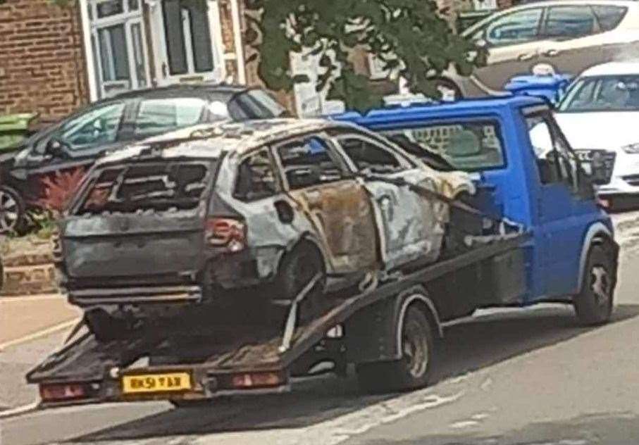 A taxi burst into flames in St Michael's Road, Sittingbourne, earlier today. Picture: Mark Mattocks