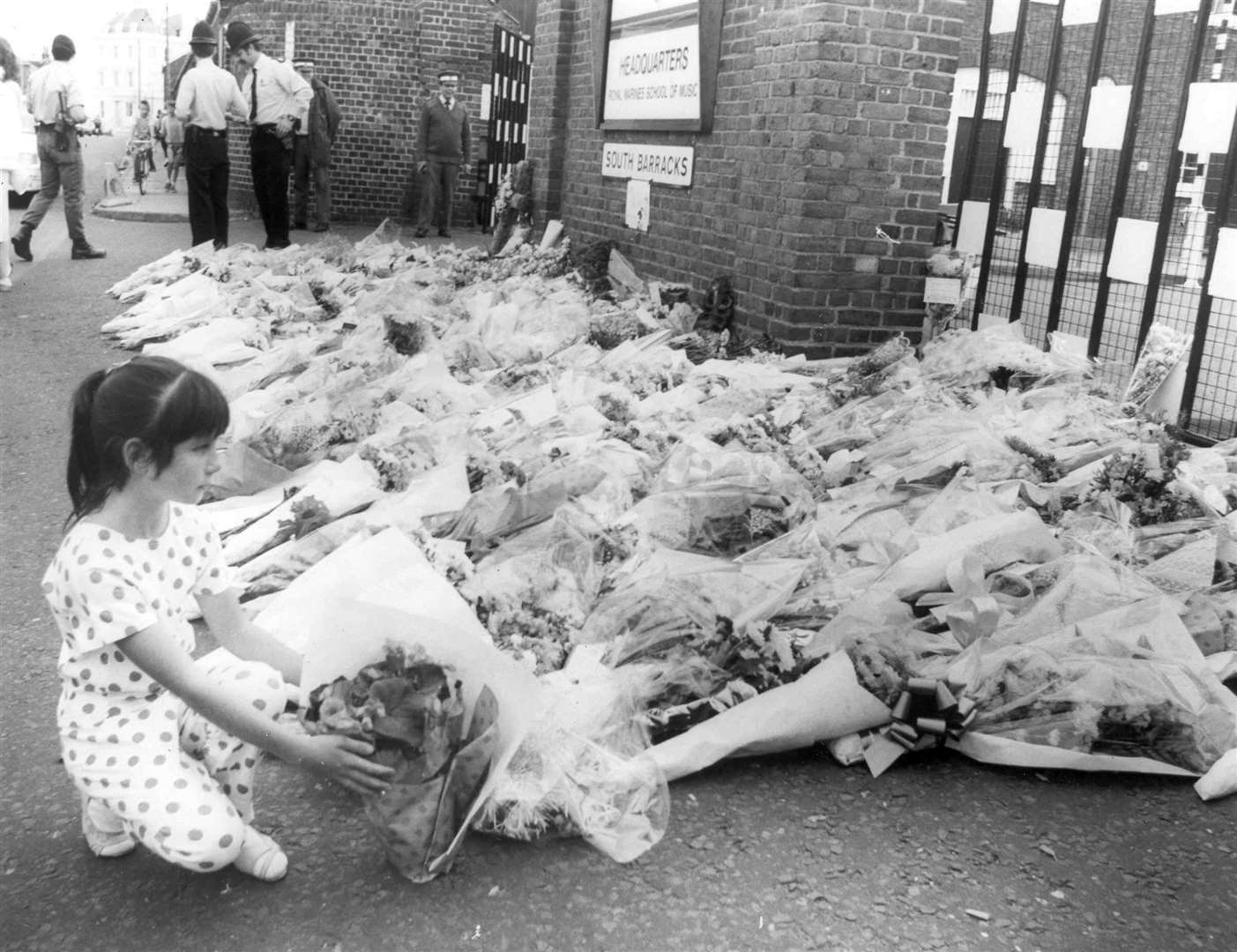 Floral tributes are left to the victims of those killed in the IRA attack