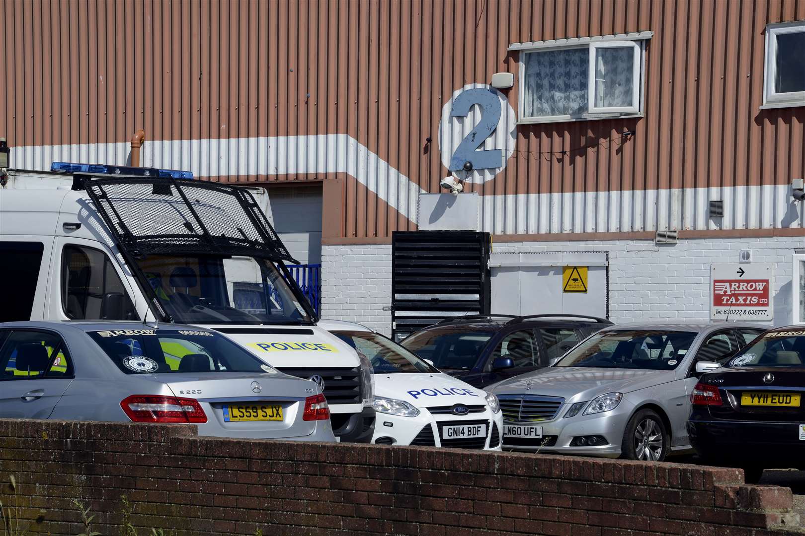 Police at the scene on the Cobbs Wood Industrial Estate