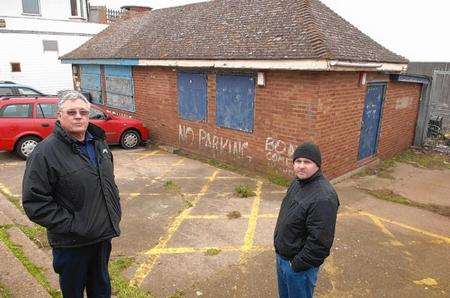 Brian Spoor and Chris Foulds at the derelict bait and tackle shop which is to be taken over by SEAL