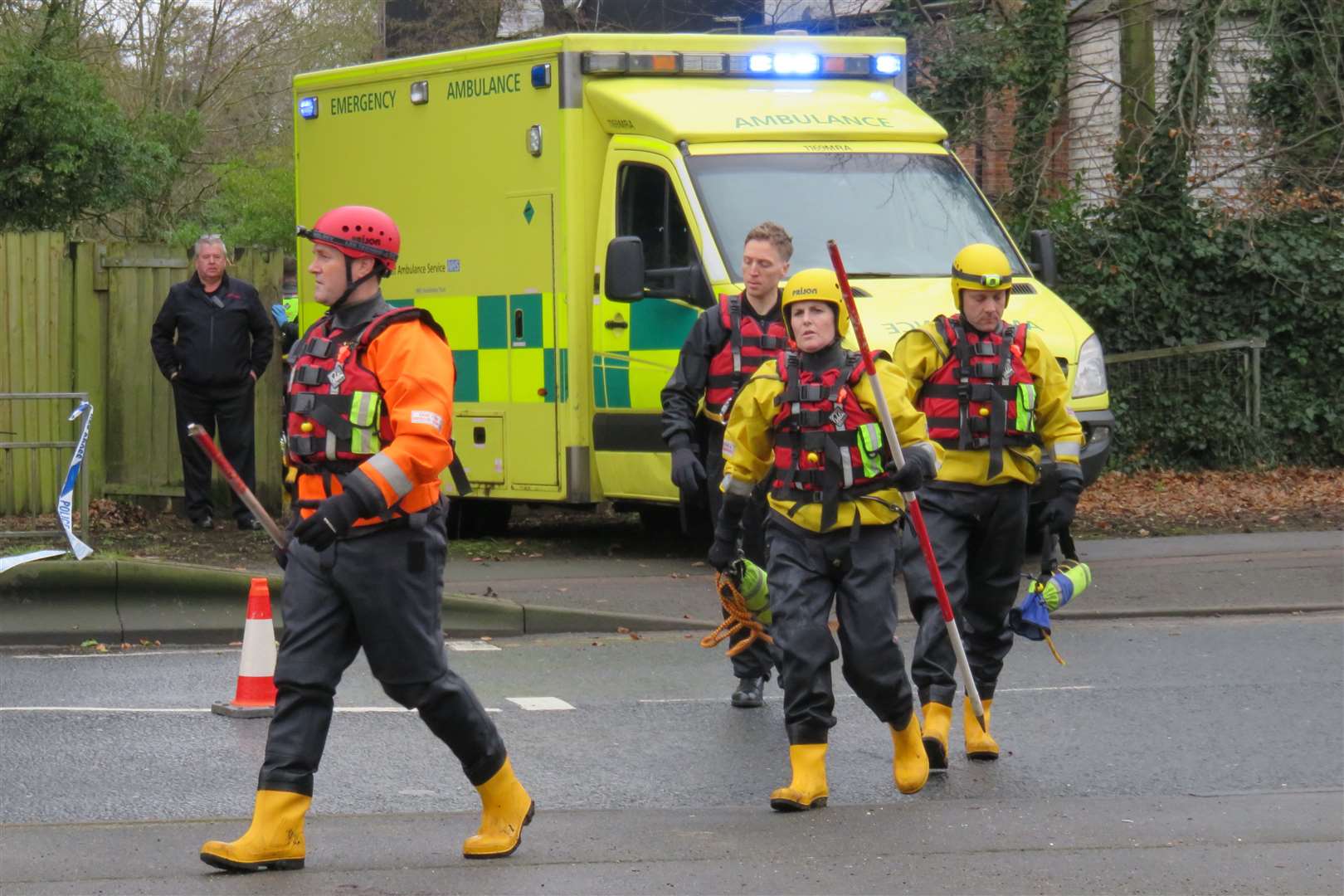 Divers searched the river after the body was found. Pictures: Andy Clark
