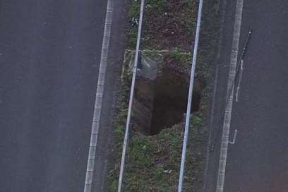 The sinkhole is in the central reservation