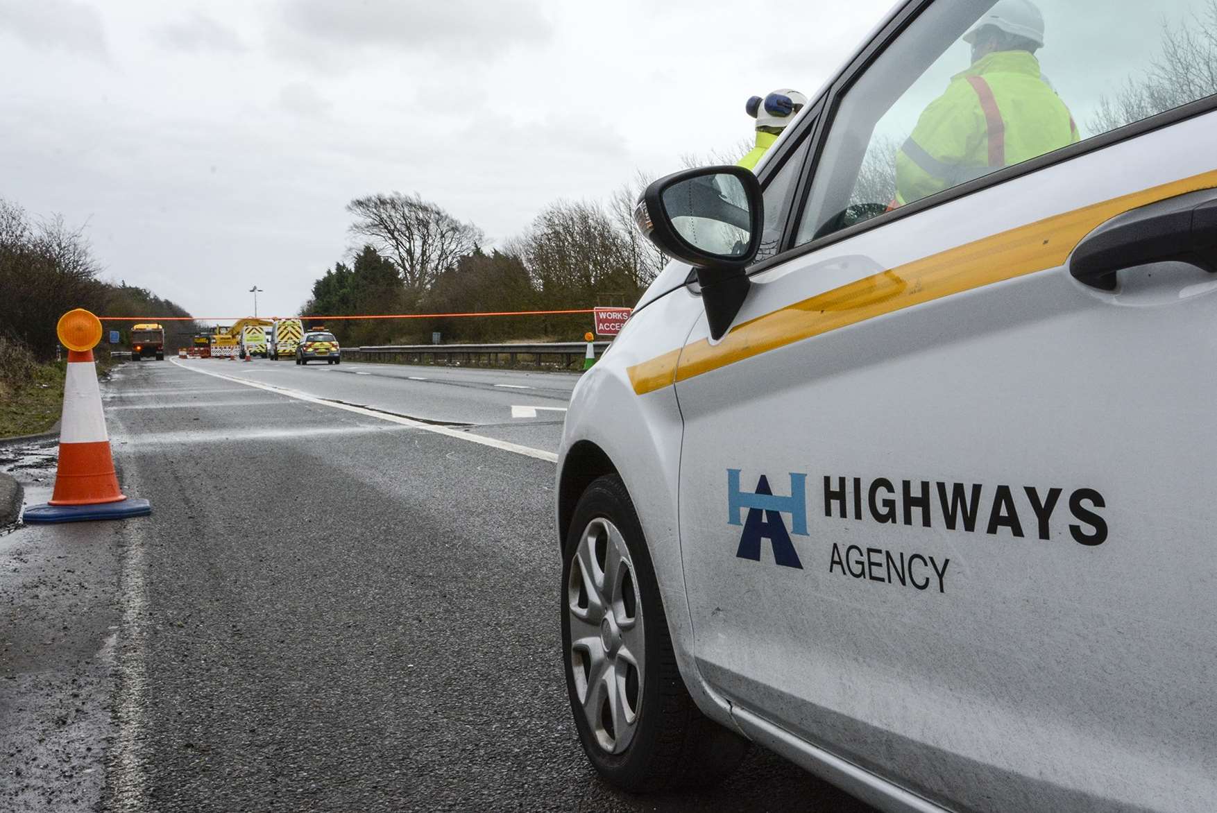 Highways Agency workers at the site. Picture: Simon Burchett