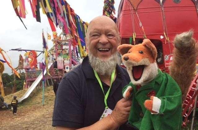 Basil Brush shares a joke with the man behind the Glastonbury Festival - Michael Eavis - during an appearance in 2017