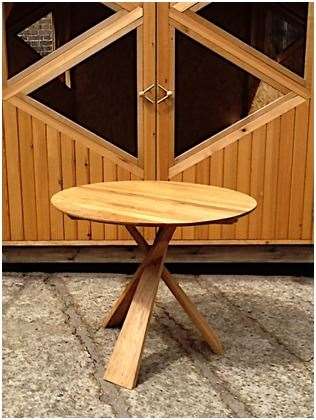 Barry Feldman exhibits his cleverly folding chairs, contrasting wood mirror surrounds and precisely detailed tables. (9533801)