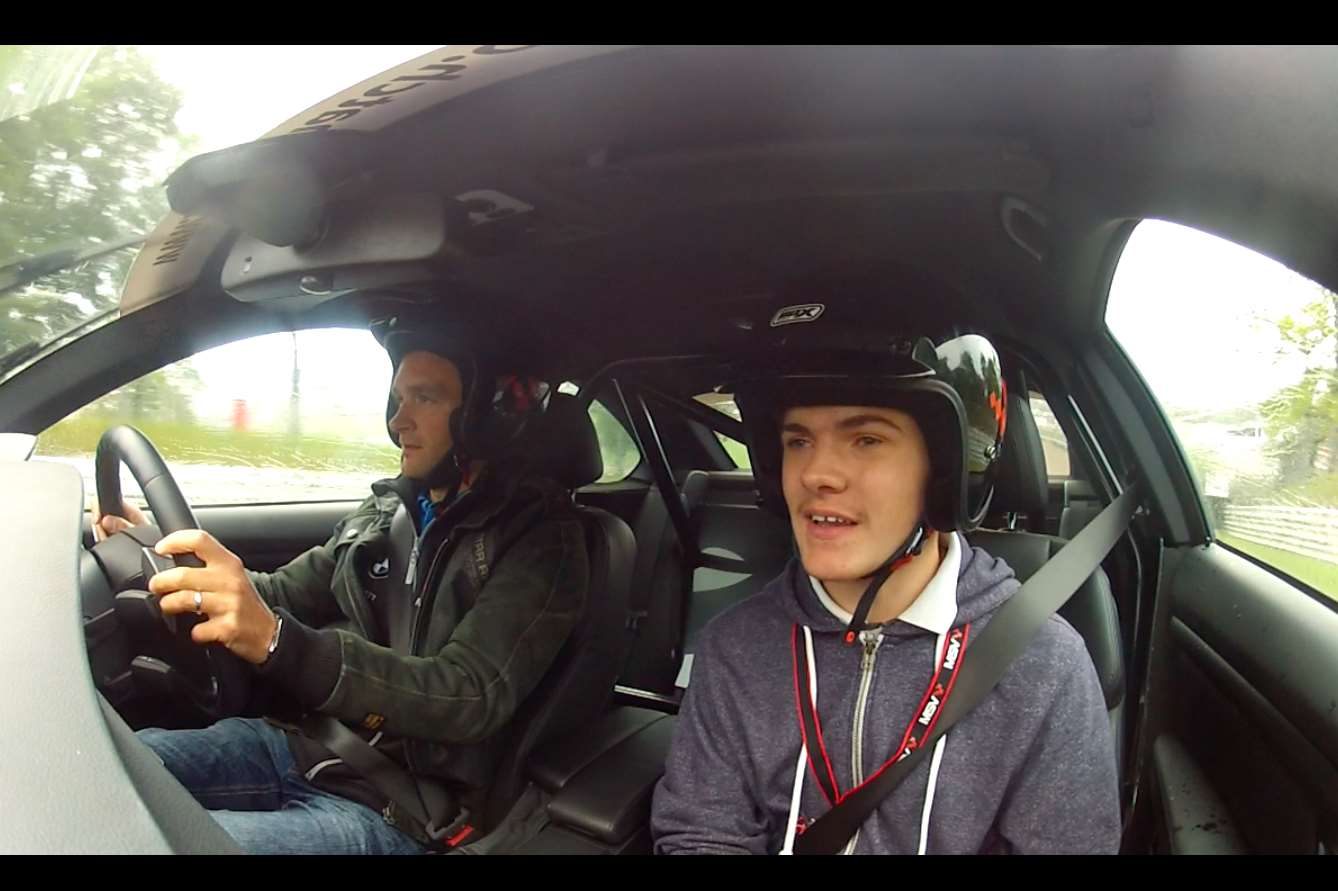KM Group's editorial apprentice Dan Wright enjoys a ride with Colin Turkington at Brands Hatch today