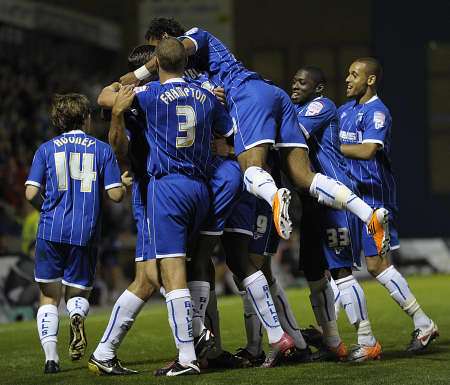 Gillingham players celebrate Garry Richards giving them the lead