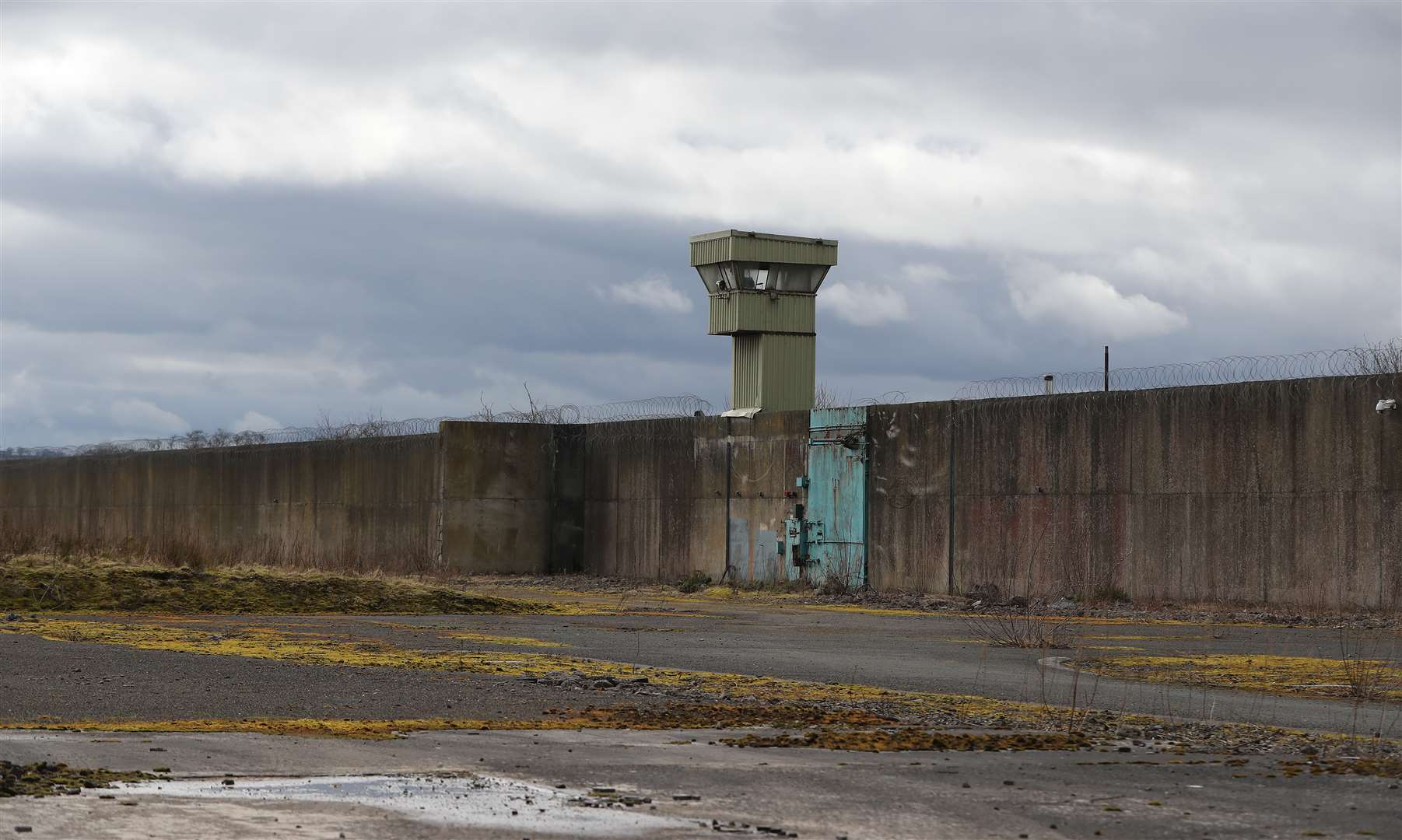 Watch towers on the remnants of the Maze Prison (Niall Carson/PA)