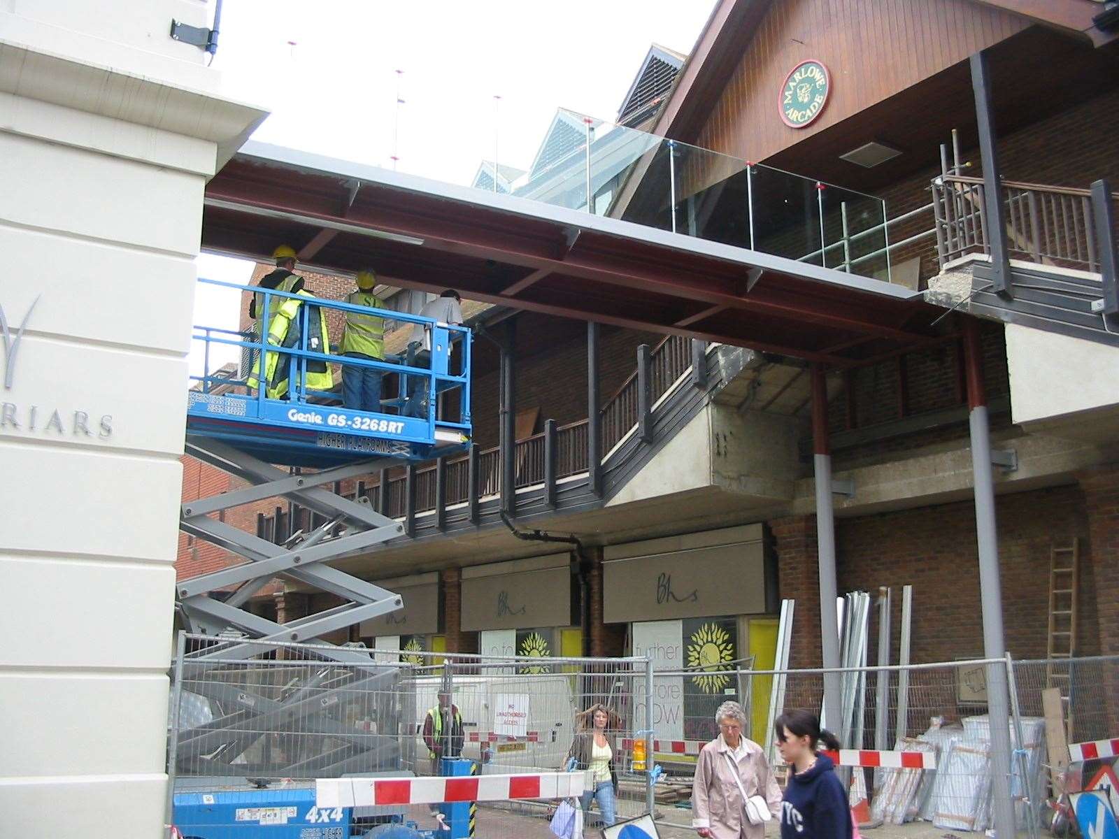 Workmen erect the latest open walkway at Whitefriars