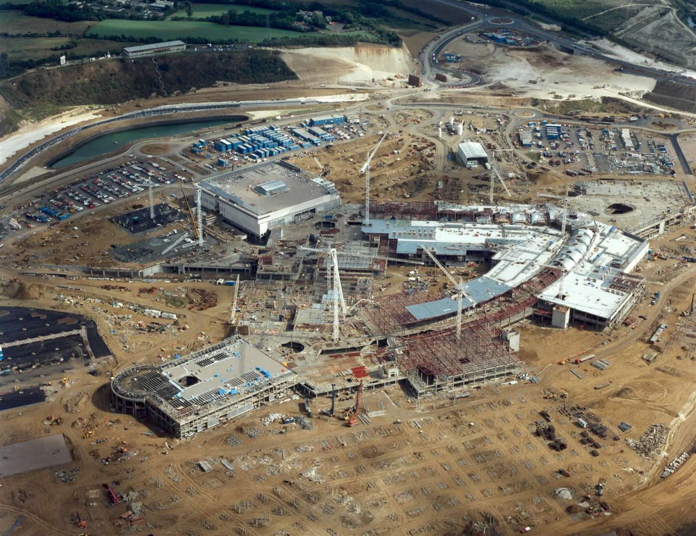 One year into the construction of Bluewater, pictured in 1997... the 240-acre site became Europe's largest shopping complex when it opened in 1999. Pic: Chorley Handford