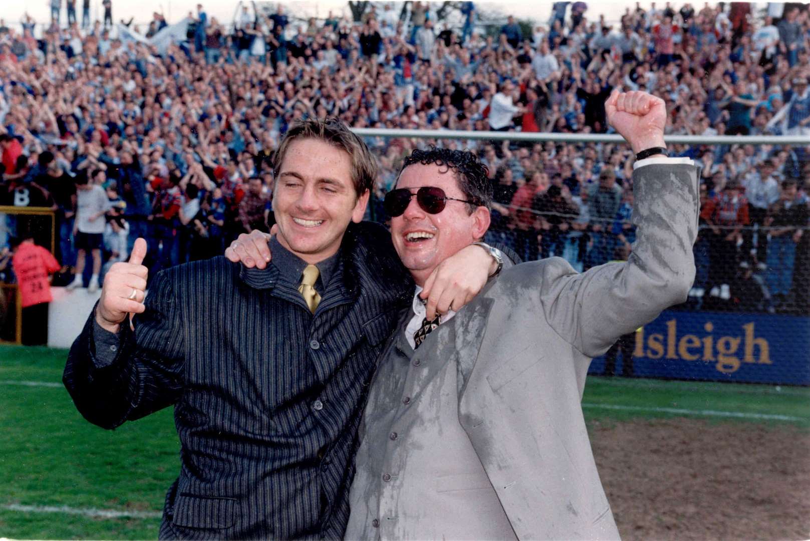 Paul Scally, right, celebrating at Priestfield in 1996 as Gillingham gained promotion from the old Division Three (now League Two)