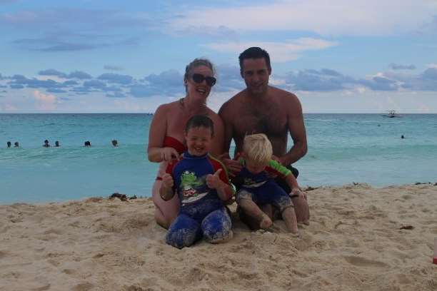Rachel Thomas with her husband Luke and sons Hugo and Pierce enjoying their holiday on the beach