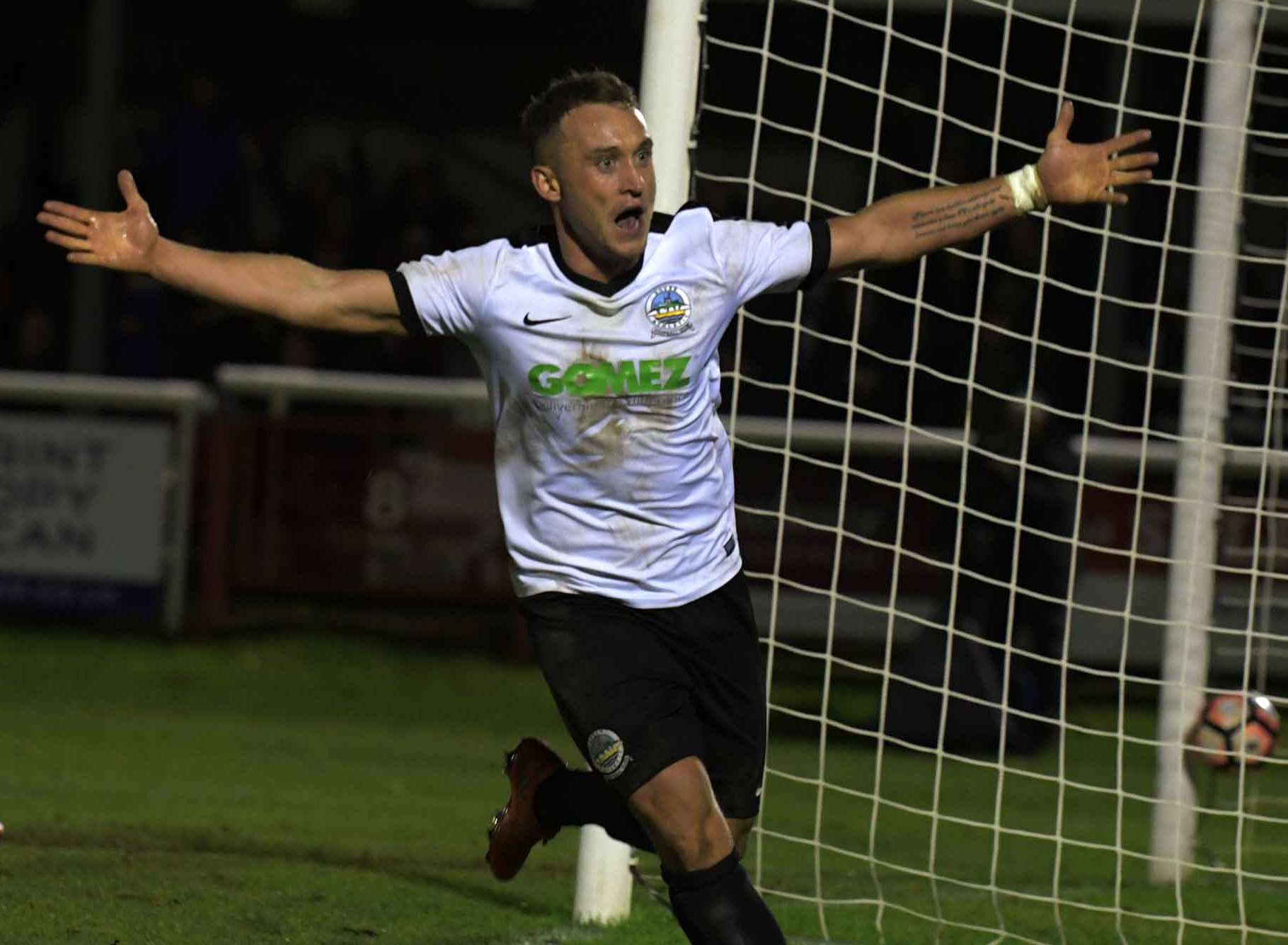 Dover striker Ricky Miller celebrates his goal against Cambridge. Picture: Barry Goodwin
