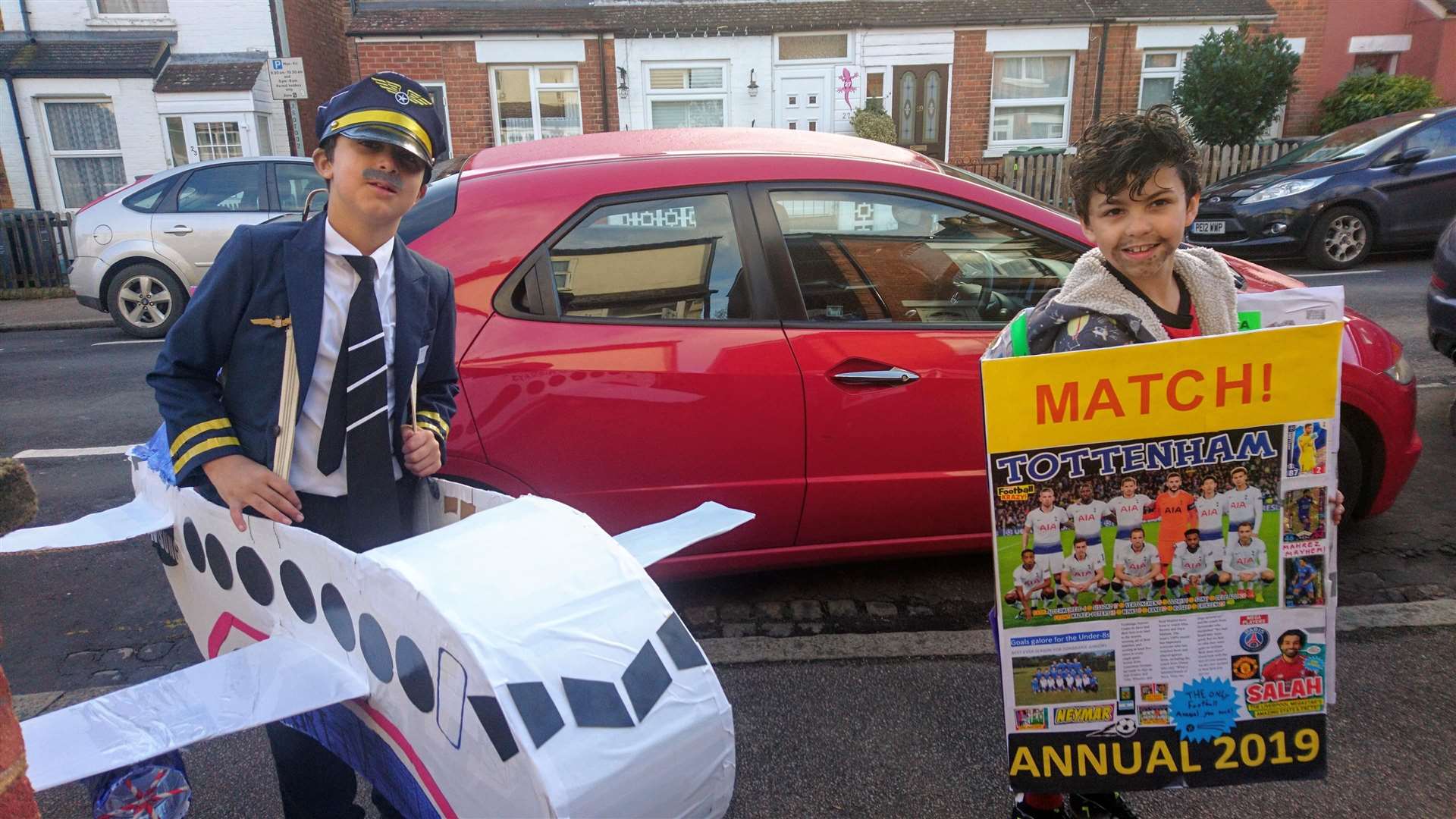 Sussex Road Primary School pupils Danny Raveney, aged 10, as Captain Sully who landed his plane on the Hudson River and brother Jojo, age eight, who went as the Match Annual.
