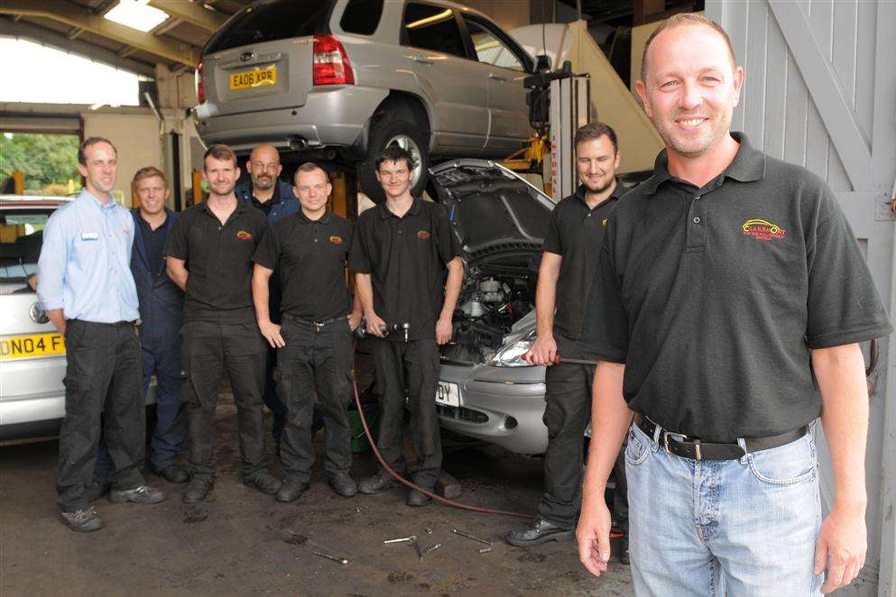 Claremont Motor Engineers, Watling Street, Dartford. Russell White, Director, right, with the team.